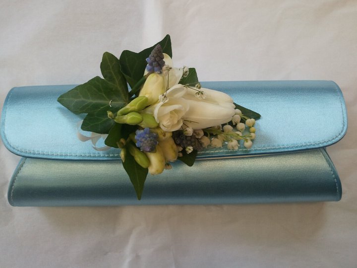 Eileen Jenkins All cream tulip, freesia and muscari bag corsage